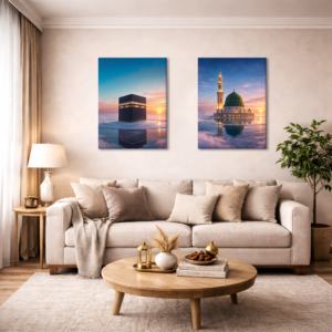 Luxury Islamic wall art set featuring the Kaaba and Masjid an-Nabawi at sunset, displayed above a modern beige sofa, perfect for premium Islamic home décor, Muslim living room wall art, and elegant interior design in Pakistan.